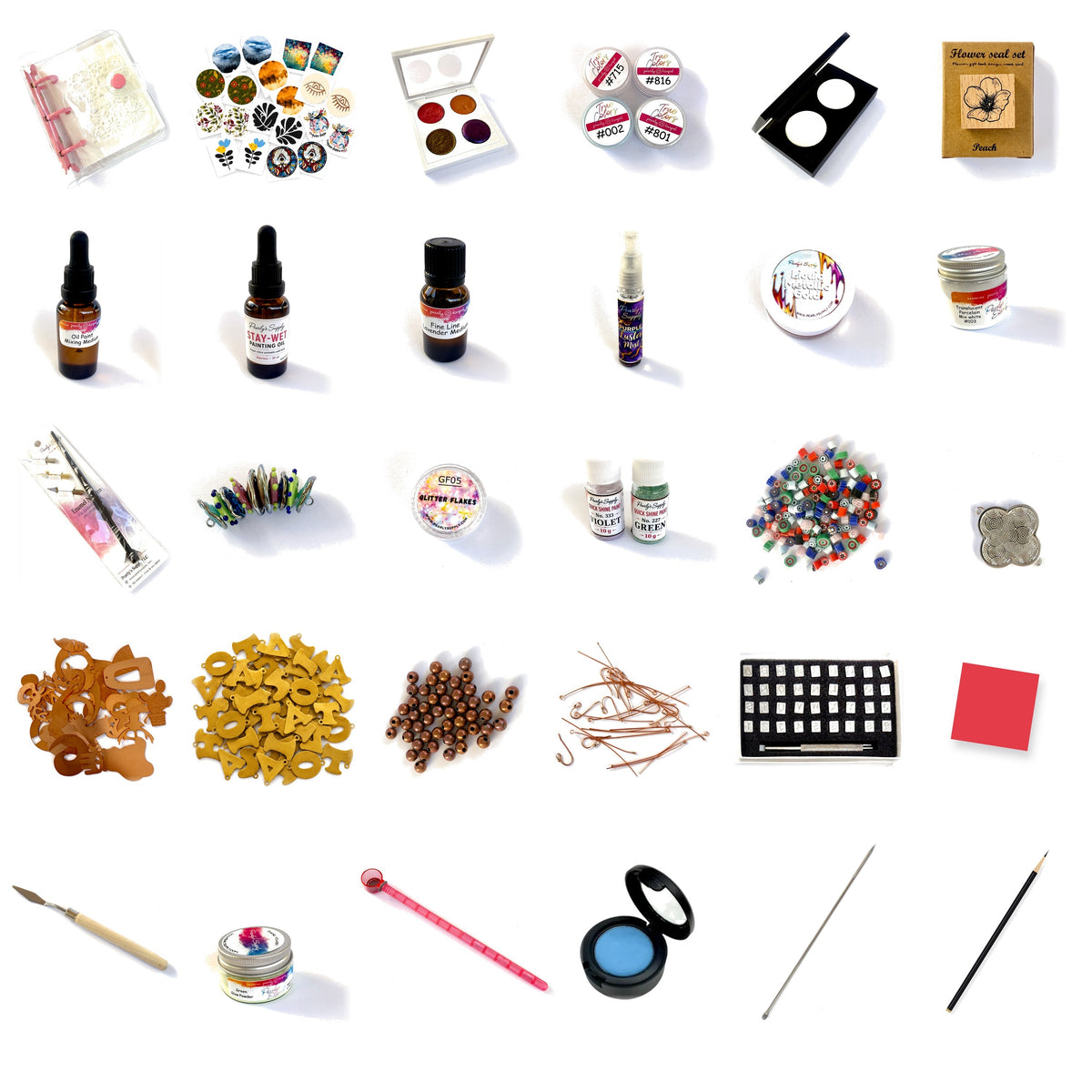 All 30 enamel supplies in the advent calendar on white