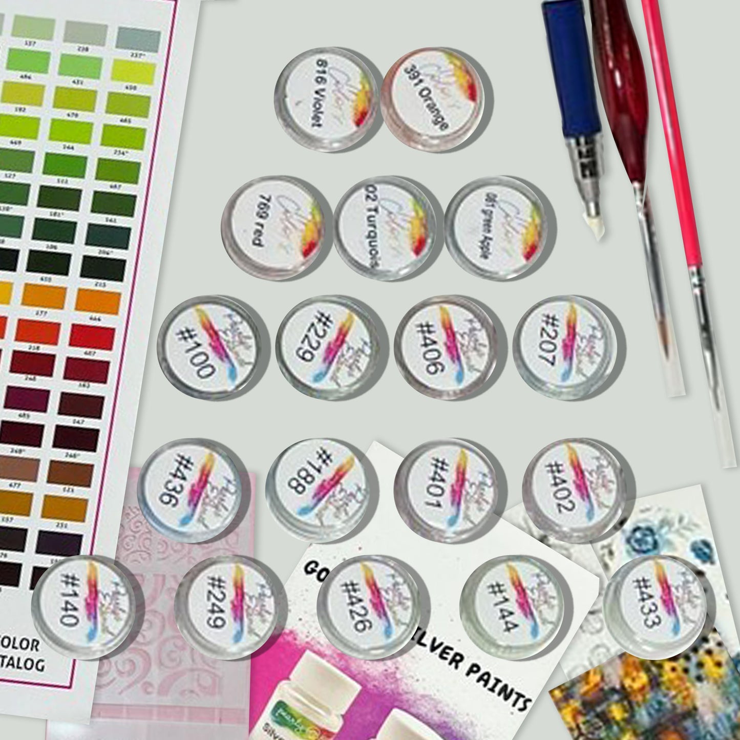 a variety of paint samples and paint brushes