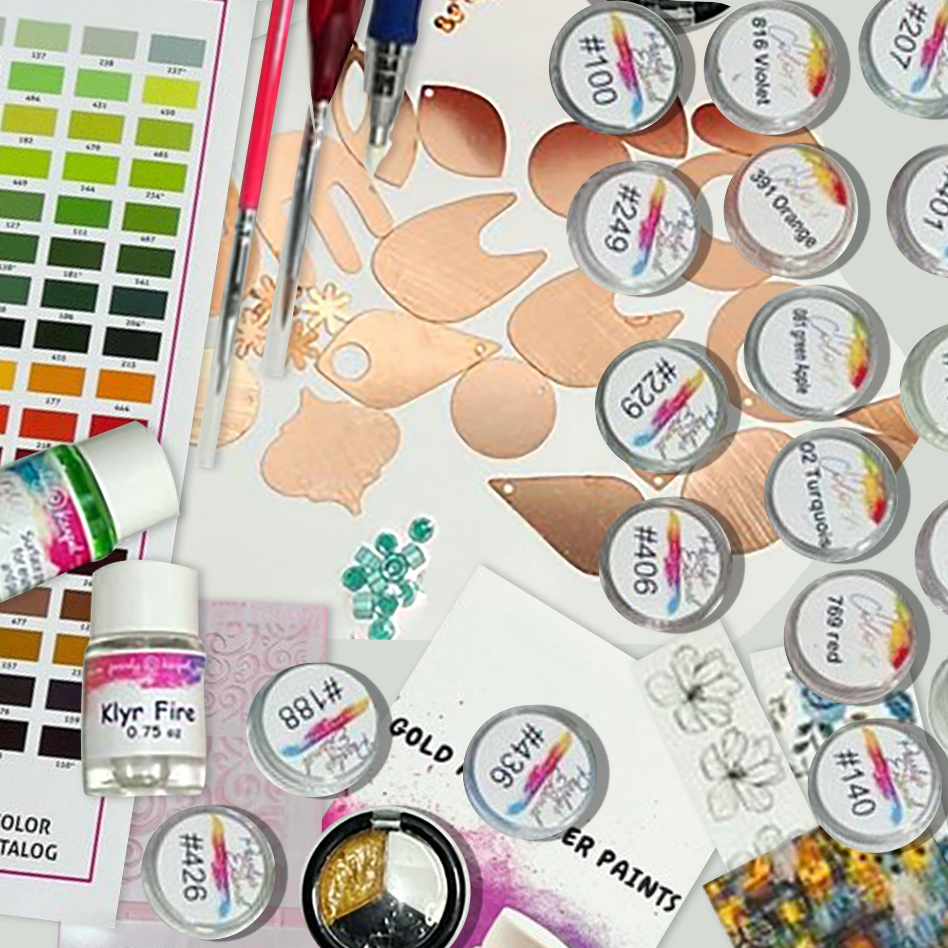a variety of crafting supplies including paint, paper, and stickers