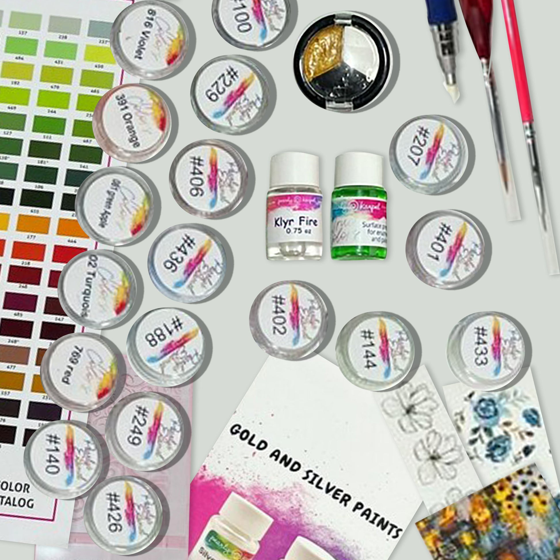 a variety of paint and supplies are displayed on a table
